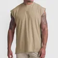 Close-up of khaki loose-fit sleeveless men's gym tank top for athletic training - M / Tops / Khaki Solid