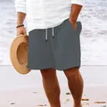 Macro view of grey cotton-linen beach shorts with drawstring and textured fabric. - S / Bottoms / Gray