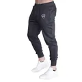 Side view of dark grey men's slim fit joggers featuring drawstring waist and crown logo detail - Dark Gray