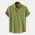 Detalle de camisa verde para hombre con tejido arrugado y manga corta en percha - 3XL / Tops / Verde