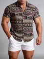 Detail of men's Hawaiian shirt with ethnic elephant print on a muscular model - TC12 Ethnic Elephant