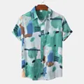 Front view of men's short-sleeve shirt with green abstract Hawaiian print - Green (C99)
