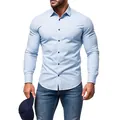 Detail shot of a men's light blue slim-fit long-sleeved casual shirt with dark buttons - Light Blue