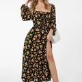Close-up detail of a French floral print midi dress featuring long sleeves and a high slit - S / Bottom (28616) / Gold