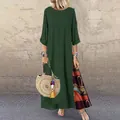 Vista detallada de un vestido de retazos retro verde oscuro con panel floral elegante - M / Top Y Pantalón / Verde