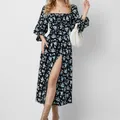 Macro view of a French floral maxi dress featuring a square neck and high slit detail. - S / Bottom (28616) / Blue