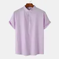 Close-up of a lavender men's cotton linen shirt with a mandarin collar and buttons. - Purple