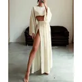 Beige linen blend two-piece set featuring a long sleeve crop top and high-slit maxi skirt - S / Top And Bottom / Apricot