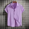 Detailed view of casual men's lilac short-sleeve shirt featuring unique crinkle texture - 3XL / Tops / Purple