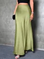 Detailed view of elegant green satin silk-like maxi skirt showing soft texture - XS / Bottoms / Green
