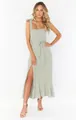 Elegant sage green sleeveless midi dress with bow straps and side slit detail. - Light Green