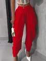 Close-up view of high-waist red flower bud trousers featuring elegant pleated details. - Red