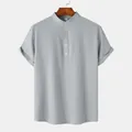 Close-up of grey short-sleeved cotton linen shirt with stand collar and buttons - Gray