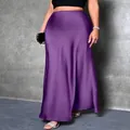 Elegant purple satin maxi skirt with a smooth silk-like finish for a chic summer look - XS / Bottoms / Purple