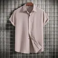 Detail view of khaki men's short sleeve shirt showing textured fabric and buttons - 3XL / Tops / Pink