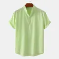 Front view of men's lime green cotton linen shirt with mandarin collar and henley button placket - Green
