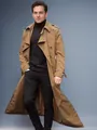 Detailed view of a man wearing a stylish long khaki trench coat over a black turtleneck. - S / Tops / Khaki