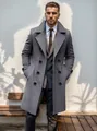 Men's mid-length grey wool overcoat with double-breasted buttons in urban setting. - S / Tops / Gray