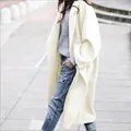 Elegante oversized witte wollen jas voor dames met een lang silhouet en reverskraag. - Wit
