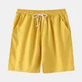 Detailed view of men's yellow casual cotton linen shorts with elastic waist and drawstring - S / Bottoms / Yellow