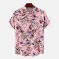 Detailed macro view of a pink men's casual short-sleeve shirt with floral pattern - 3XL / Tops / Pink