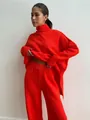 Ensemble tricoté rouge-orange vif avec pull à col roulé et pantalon large de détente - S / Haut Et Bas / Rouge