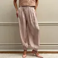 Chic pink satin loose-fit harem pants for women, comfortable elegant lounge style wear - S / Pink