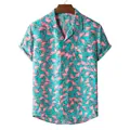 Close-up of men's short-sleeved shirt featuring vibrant pink flamingo print on teal - M / Tops / Teal Pink Flamingo Print (XH37)