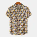 Detailed view of men's short-sleeved shirt with geometric diamond pattern and buttons. - CD20240218520 / S