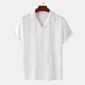 Vue de face d'une chemise décontractée blanche à manches courtes avec col classique. - M / Hauts / Blanc