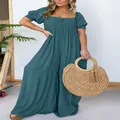 Plus size solid teal pleated jumpsuit featuring puff sleeves and elegant wide leg design - S / Top And Bottom / Blue Gold