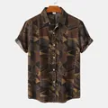 Full front view of a stylish men's brown geometric print short-sleeved button-up shirt - CD20240218517 / S