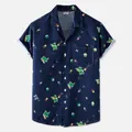 Detailed macro view of pixel dinosaur print on navy blue Hawaiian beach shirt - Pixel Art Dinosaur Space (XH73)