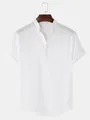 Vue détaillée d'une chemise blanche en lin avec col mao et tissu respirant léger. - M / Hauts / Blanc