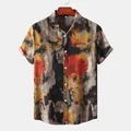 Detailed view of men's casual short-sleeved shirt featuring abstract artistic paint print - M / Tops / Multicolor