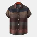 Detail view of a men's ethnic style short sleeve shirt with wave patterns and stripes - M / Tops / Coffee