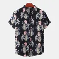 Close-up detail of men's floral Hawaiian short-sleeve shirt with pink flowers on black - 3XL / Tops / Style HJ-34248003