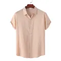 Detail of a men's light orange vertical striped short-sleeved casual beach shirt on a hanger - Light Orange Striped