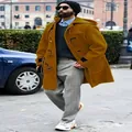 Street style view of a men's thick mustard yellow hooded duffle coat with horn buttons. - M / Tops / Turmeric
