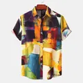 Close-up detail of artistic abstract oil painting print on men's short sleeve casual shirt - M / Tops / Yellow