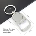 Detailweergave van de zinklegering flesopener sleutelhanger met afmetingen - K5 (Traanvormige Ovale Stijl)