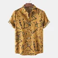 Detail view of mustard yellow men's casual shirt with black ethnic graffiti print - M / Tops / Khaki