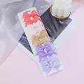 Set of 10 mini candy-colored grosgrain ribbon hair bows for girls on a white display card. - Pink Purple Khaki Series