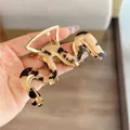 Large tortoiseshell acetate hair claw clip with golden metal spring for thick hair - Wave Tortoise Shell