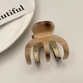 Elegant amber brown acetate hair claw clip accessory for high ponytail hairstyling - Pumpkin Tortoise Shell