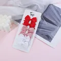 Set of 6 mini ribbon bow hair clips for baby girls in vibrant red, pink, and white colors - Red Pink White Combo
