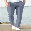 Dettaglio dei pantaloni in lino da uomo con coulisse in azzurro, perfetti per l'estate. - Grigio