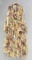 Detailed look at yellow floral maxi dress with ruffle tiers and rhinestone V-neck - Beige