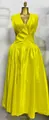 Detailed view of the elegant pleated bodice and waist design of this bright yellow maxi dress. - S / Top And Bottom / Yellow
