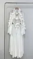 Elegant white long dress with layered ruffles and lace details on a hanger - White